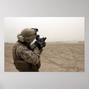 A Marine fires the M-32 Poster