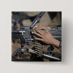 A Marine loads a M-240G machine gun 15 Cm Square Badge