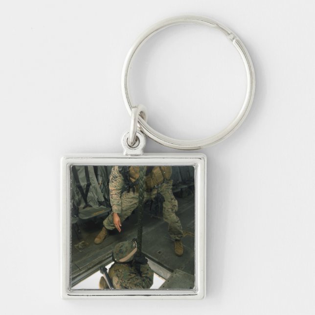 A Marine sends a fellow Marine down the hell ho Key Ring (Front)