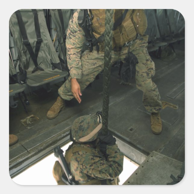 A Marine sends a fellow Marine down the hell ho Square Sticker (Front)