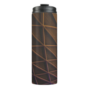A meshwork of steel beams on an illuminated facade thermal tumbler