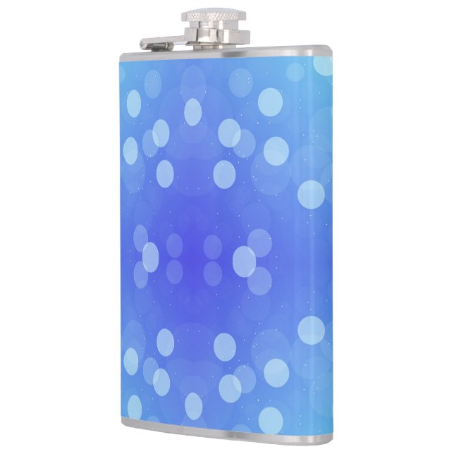 A metal flask featuring a vibrant blue background  (Left)