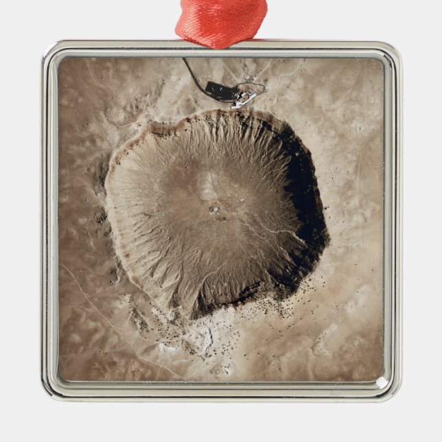 A meteorite impact crater metal tree decoration (Front)