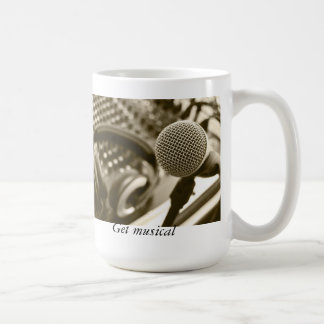 A microphone and headphones coffee mug