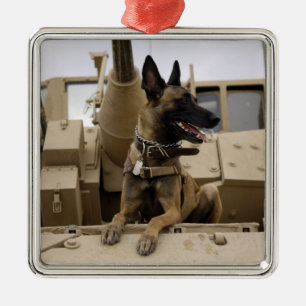 A military working dog sits on a M2A3 Metal Tree Decoration