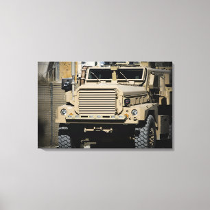 A mine-resistant, ambush-protected vehicle canvas print