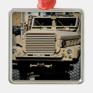 A mine-resistant, ambush-protected vehicle metal tree decoration