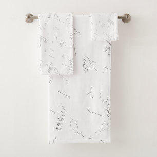 A minimalist white line art sketch depicts a simpl bath towel set