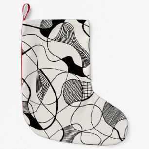 A monochrome abstract pen and ink sketch; irregula small christmas stocking