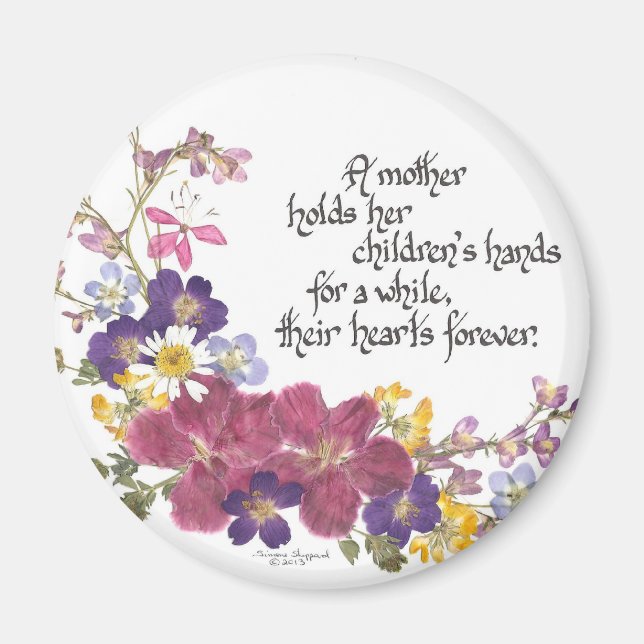 A Mother holds a child's heart Magnet (Front)