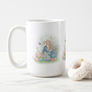 A mother rabbit with a baby rabbit in a clearing w coffee mug