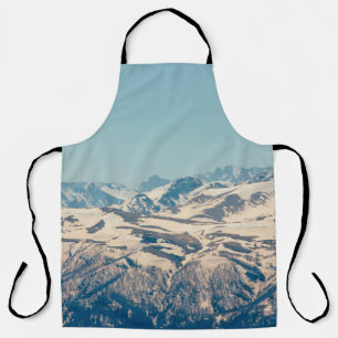 A mountain range with thawing snow and ice in the apron