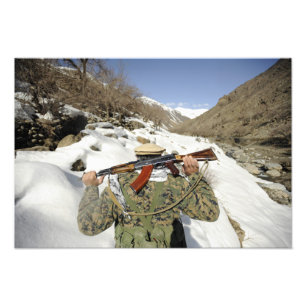 A Mujahadeen Guard walks with US Military membe Photo Print