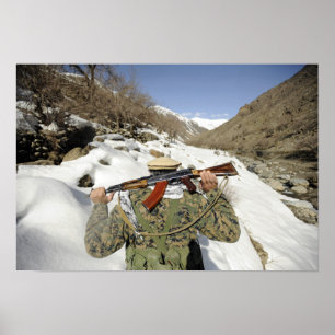 A Mujahadeen Guard walks with US Military membe Poster
