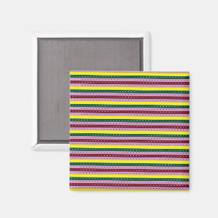 a multicolored striped background with dots magnet