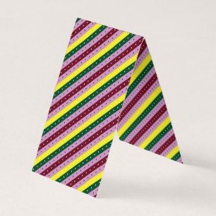 a multicolored striped pattern with dots business card