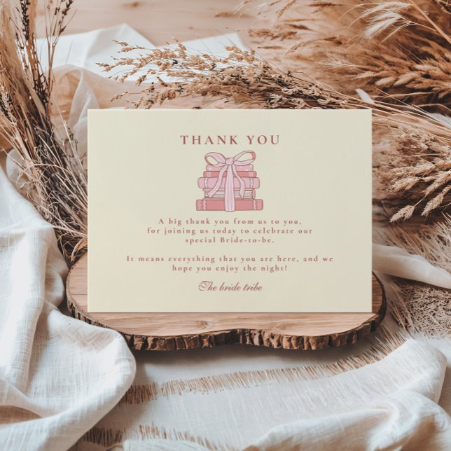 A new chapter begins pink books and bow thank you card (Creator Uploaded)