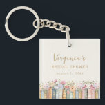 A New Chapter Books Bridal Shower Key Ring<br><div class="desc">A New Chapter Begins. Carry a piece of your love story everywhere with the Wildflower and Books keychain, a small but meaningful keepsake that blends literary charm with timeless elegance. Featuring handpainted watercolor illustrations of stacked books and delicate wildflowers in soft pinks, blues, greens, and gold, this beautifully designed keychain...</div>