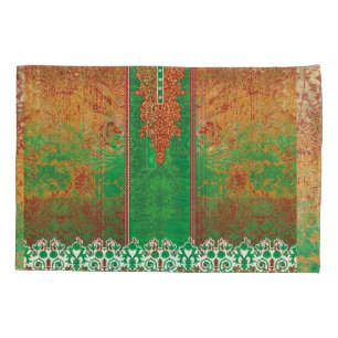 a painting of a green field with an orange border pillowcase