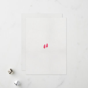 a pair of red leaves on a black background holiday card