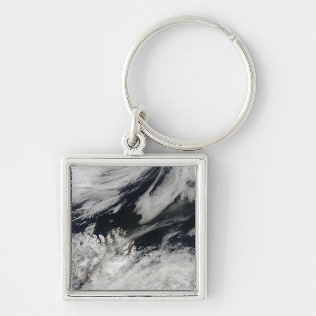 A pale grey ash plume blows from the summit key ring (Front)