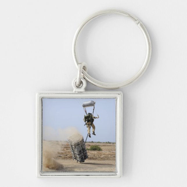 A pararescueman drops into the zone key ring (Front)