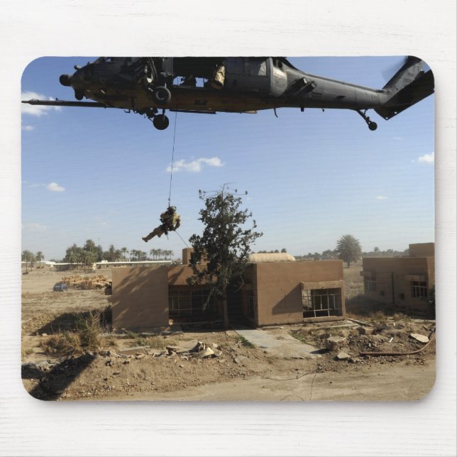 A pararescueman rappels from an HH-60 2 Mouse Mat (Front)