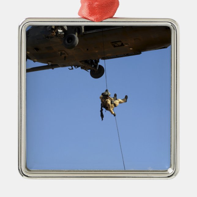 A pararescueman rappels from an HH-60 Metal Tree Decoration (Front)