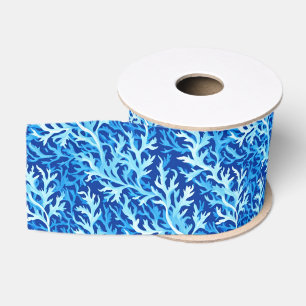 a pattern of stylised, seaweed-inspired fronds in grosgrain ribbon