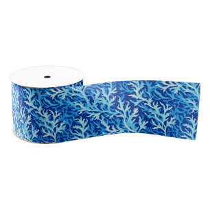 a pattern of stylized, seaweed-inspired fronds in grosgrain ribbon