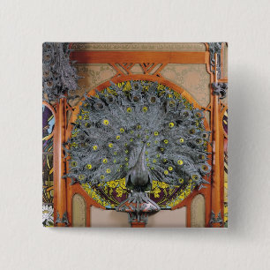 A peacock from the central panel of a mural 15 cm square badge