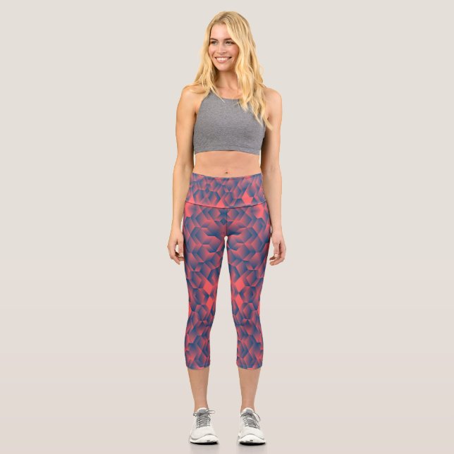 A person wearing high-waisted, geometric-patterned capri leggings (Front)