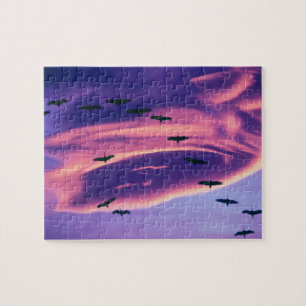 A photo composite of Sandhill cranes in flight Jigsaw Puzzle