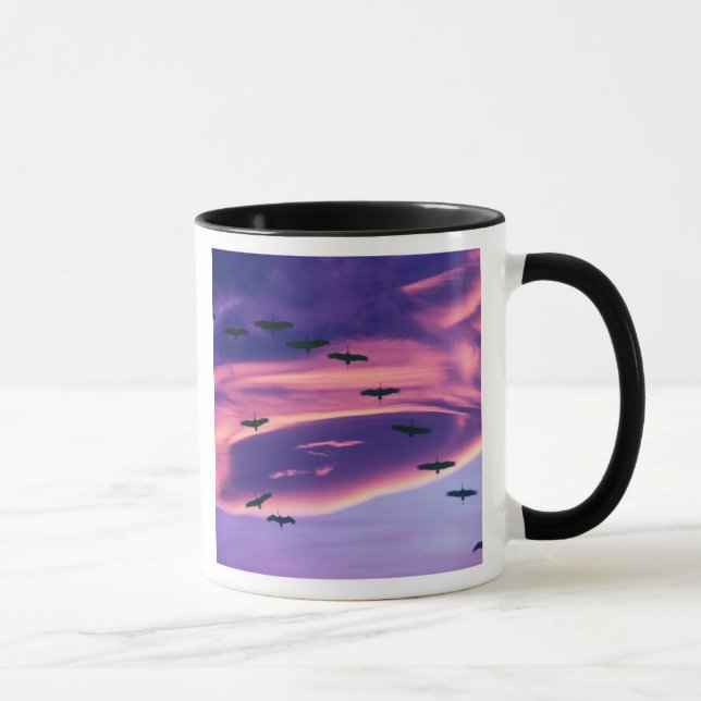 A photo composite of Sandhill cranes in flight Mug (Right)