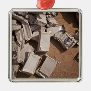 A pile of Meals Ready to Eat Metal Tree Decoration