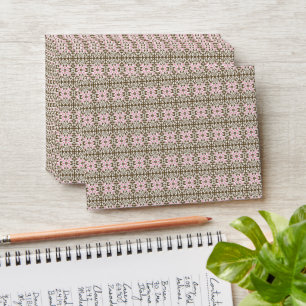 a pink and brown pattern on a white background envelope