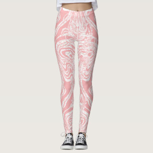 a pink and white abstract design on a white backgr leggings