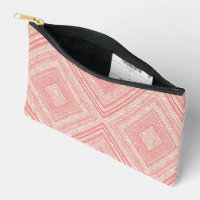 a pink and white background with a diamond pattern