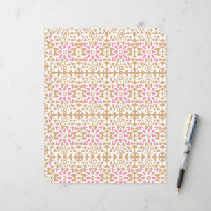 a pink and white flower pattern on a brown backgro