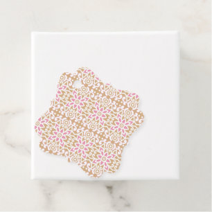 a pink and white flower pattern on a brown backgro favour tags