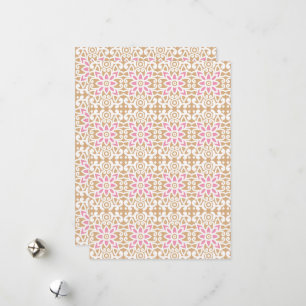 a pink and white flower pattern on a brown backgro holiday card