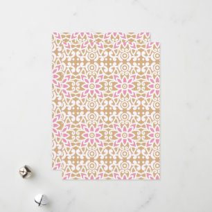 a pink and white flower pattern on a brown backgro holiday card