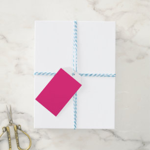 a pink background with a black border gift tags