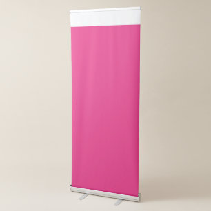 a pink background with a black border retractable banner