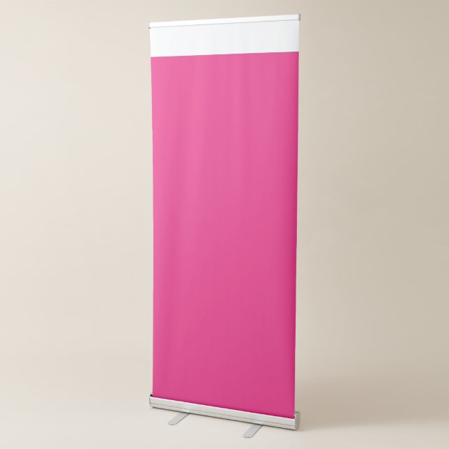 a pink background with a black border retractable banner (3/4)