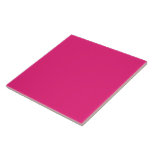 a pink background with a black border tile<br><div class="desc">The design is a large blue square,  which appears to be a bright and clear sky. The colour of the sky is a deep shade of blue,  giving it a vibrant and lively appearance.</div>