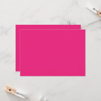 a pink background with a black