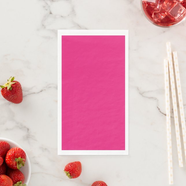 a pink background with a black napkin (Insitu)