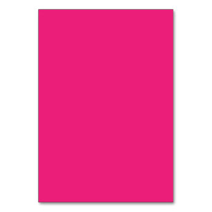 a pink background with a black table number
