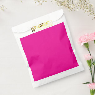 a pink background with a  favour bags